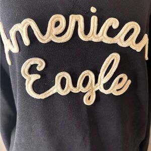 American Eagle Sweatshirt with White Lettering.